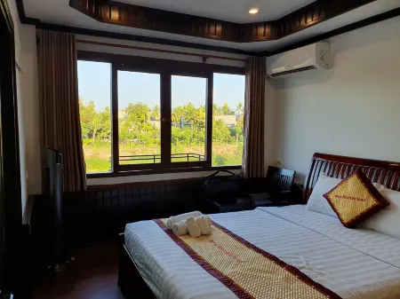 Merry Riverside Hotel Отели в г. Луанг Прабанг