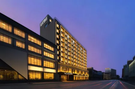 Qiuguo Hotel (Olympic Sports Center) Отели рядом с достопримечательностью «Zhengzhou Botanical Garden»