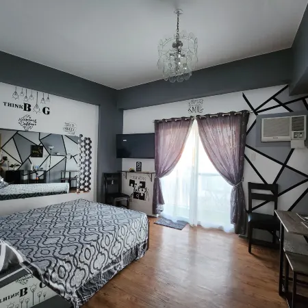 Condo Azur Suites Amani A125, near Airport, Netflix, Cozy with Luxurious Pool and Gym