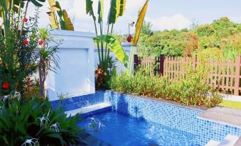 Xishuangbanna Menghai Dream Xiangjia Hot Spring Cloud Villa