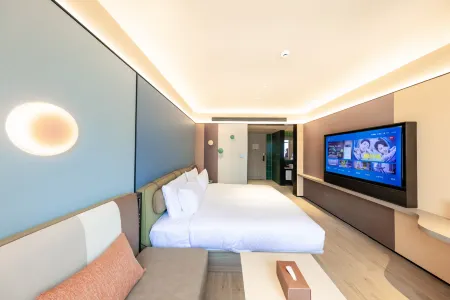 Orange Wuhan Optics Valley University GardenRoad HotelRoad) Отели рядом с достопримечательностью «Wuhan Vocational College of Communication and Publishing»