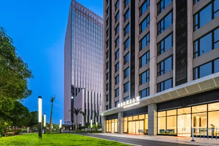 Xin Aolin Hotel (Zhuhai Tangjiawan Station) Отели рядом с достопримечательностью «Gong Amusement Park»