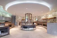 Ginkgo Qizhuang Hotel - servizio colazione