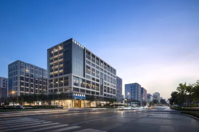 Wanjia Boutique Hotel (Tianjin Binhai International Airport Wangfujing Outlet New Yansha Town) Отели в г. Тяньцзиньский международный аэропорт Биньхай. экономическая зона аэропорта