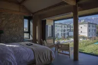 Dali Mountain Sleeping House Mountain View and Ji Courtyard Отели рядом с достопримечательностью «Живая ферма в Дмидо»