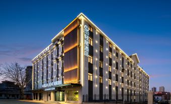 Qingdao Zhanqiao Railway Station Light Residence Hotel