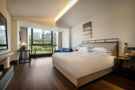 Hengxuan Hotel (Zhongxian Wanda Plaza) Отели рядом с достопримечательностью «Zhongzhou Old Street»