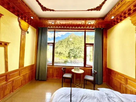 Zhagana Pure Land Homestay Отели в г. Диебу