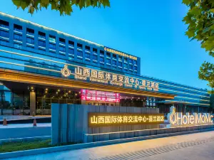 Shanxi International Sports Exchange Center. Hotel MoMc (Red Lantern Stadium)