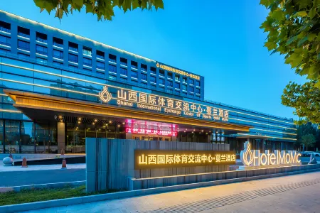 Shanxi International Sports Exchange Center. Hotel MoMc (Red Lantern Stadium) Отели рядом с достопримечательностью «Taiyuan Botanical Garden»