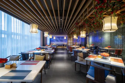 Qianna Hotel (Haikou Wanlvyuan Friendship Sunshine City Shop)