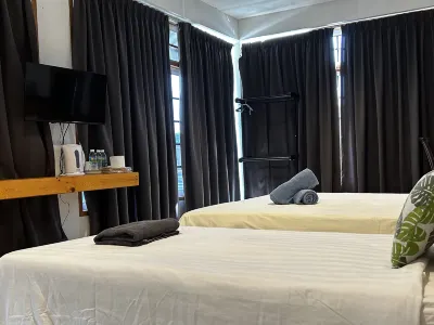 Riverbank Dungun Guesthouse & Cafe Hotels near Swan Island