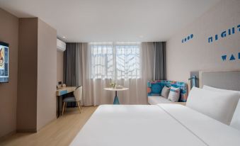 Homeinn · neo (Xishuangbanna Jinghong Poshu Plaza)