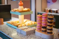Orange Hotel (Weihai Weigao Plaza Xingfumen Branch) - พร้อมอาหารเช้า