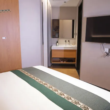 Baowan Business Hotel (Xiushui Liansheng Shopping Plaza)
