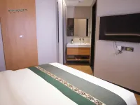 Baowan Business Hotel (Xiushui Liansheng Shopping Plaza)