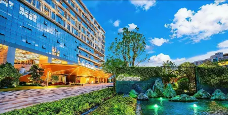 Yangzhou East High-speed Railway Station Elite Hotel Отели рядом с достопримечательностью «Longchuan Square»