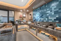 Home Inn (Jining Weishan Weishan Lake Avenue Branch) - فطور