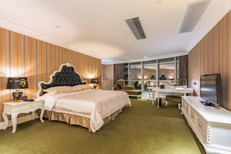 Kingdom Hotel Отели рядом с достопримечательностью «Baoneng All City Shopping Center Longgang Branch (Jianshe Road)»