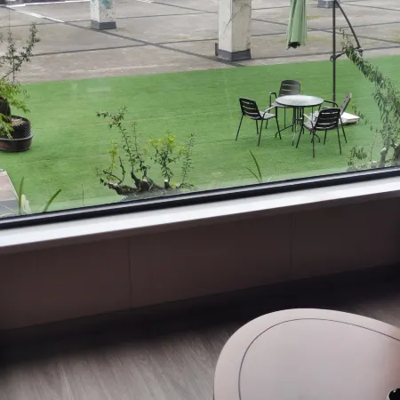 Meitan International Trade Flower Garden Hotel