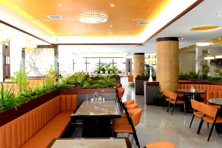 Coulomb Welcome Hotel Отели рядом с достопримечательностью «Fuyuan Temple»