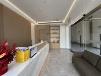 Mingji Hotel (Taizhou Bay New District Talents Apartment) Отели рядом с достопримечательностью «Чжэньская Коммерческая улица»