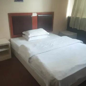 Qira Xinglong Hotel Отели в г. Целе