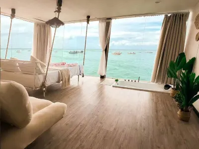 Sunny Holiday Hoteles cerca de Isla Mabul