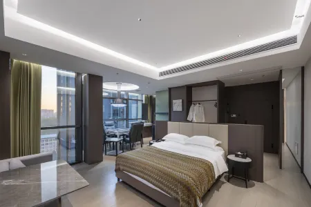 King Coziness Hotel Отели рядом с достопримечательностью «First Village of Great Changes in the Mountains»