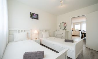 Serene Swiss Apt | scenic balcony views + parking