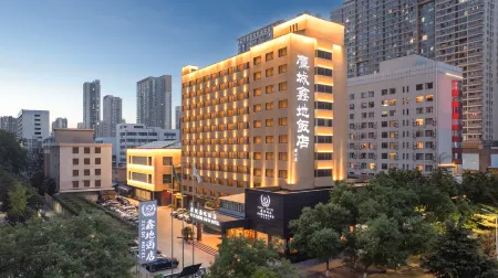 Ying Cheng Xin Di Hotel Отели рядом с достопримечательностью «University for Science & Technology Zhengzhou»