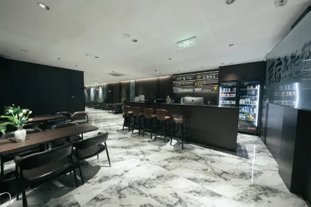 Utopian Homestay (Xuzhou Suning Plaza Minzhu North Road Subway Station) Отели рядом с достопримечательностью «China University of Mining & Technology-Beijing(Wenchang Campus)»