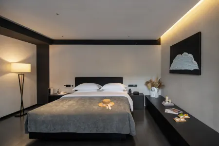 Bantang Zuoyou · Guanshan Jianxue · Private Hot Spring Healing Hotel (Baisha Ancient Town Branch) Отели рядом с достопримечательностью «Lijiang Snow Mountain Falcon Valley Scenic Area»