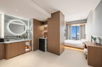 Tanyue Seaview Hotel (Zhanjiang Jinshawan Beach Wanda Plaza Branch) - 2 ดาว
