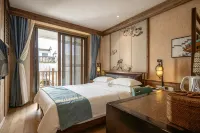 Huangshan Yijing Huizhou Intangible Cultural Heritage Homestay (Xiuli, Hongcun) - إقامة ريفية