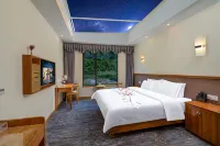 Holy Holiday Hotel Hotel di Xiaojin