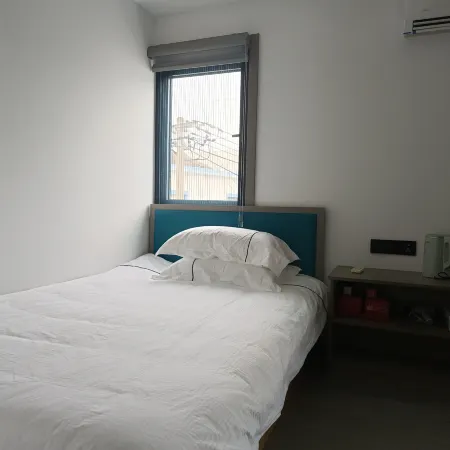 Sunshine Salon · Xiguang Crescent | Daowan Manju Scenic Apartment (Qushan Island)
