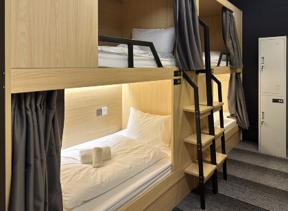 The Room Capsule Hotel