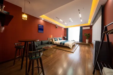 Qingpu Light Luxury Audiovisual Hotel (Longxi Gulaiwu Branch) Отели в г. Лунси