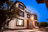 Qihai Villa Roaming Homestay (Laoshan Scenic Area Store) Hotel in zona Shuyangdong Relic Site