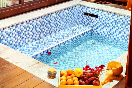 Daqian Fangguang Hot Spring Vacation Apartment Отели в г. Юнтай