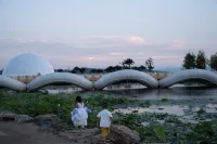 Xinyang Xingxiu River Beach Camping Hotel
