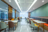 UP Huayi Selected Hotel (Huolinguole Center Road Branch) - servizio colazione