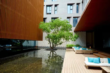 Floral Hotel·Laiye Private Hot Spring Villa (Tai Bai Mountain Tourist Center No Mountain Residence) Отели рядом с достопримечательностью «Eye of Mount Taibai»