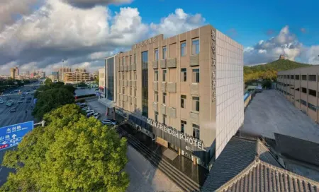 Delin Friendship Hotel Отели рядом со станцией Zaozhuang Railway Station