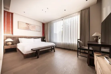 Heyang Heshan · Heyang Chinese Inn Отели рядом с достопримечательностью «Huangjinbu Colorful Mucuna Birdwoodiana Flower Base»