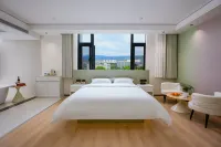 Maitreya Ten Mile Qinghuan Hotel Homestay Hotels in Mile City