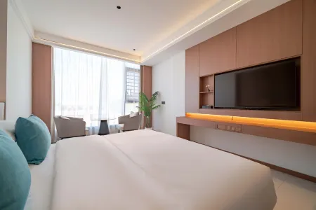 Xinghao Hotel (Huangguoshu Waterfalls Scenic Area) Отели в г. Гуанлин