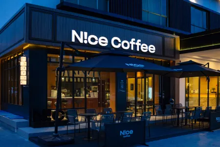 Xunmei Holiday Hotel Отели рядом с достопримечательностью «Международная прибрежная туристическая зона Сичонг»