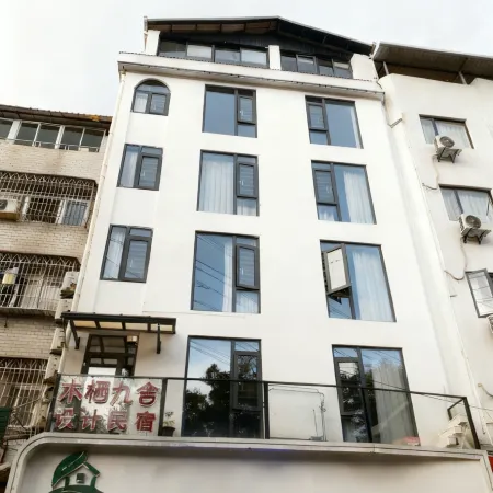 Muqi Jiushe Design B&B (Longyan Railway Station Minxi Trading City)